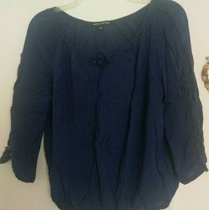 Happening in the present small blue top